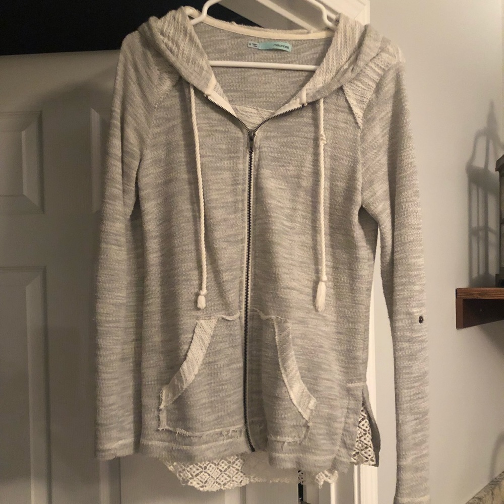 Long sleeve zip up jacket.